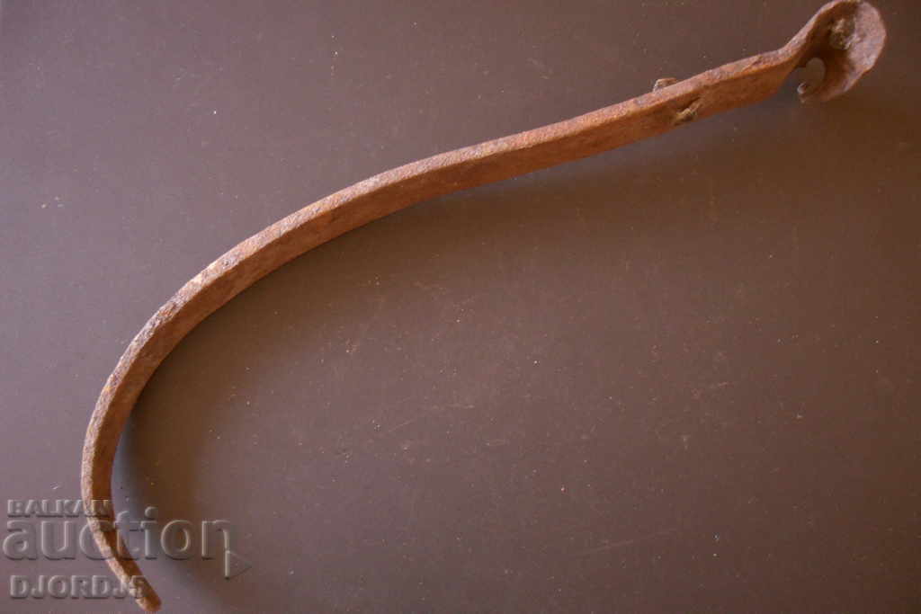 Old handle of a copper pan