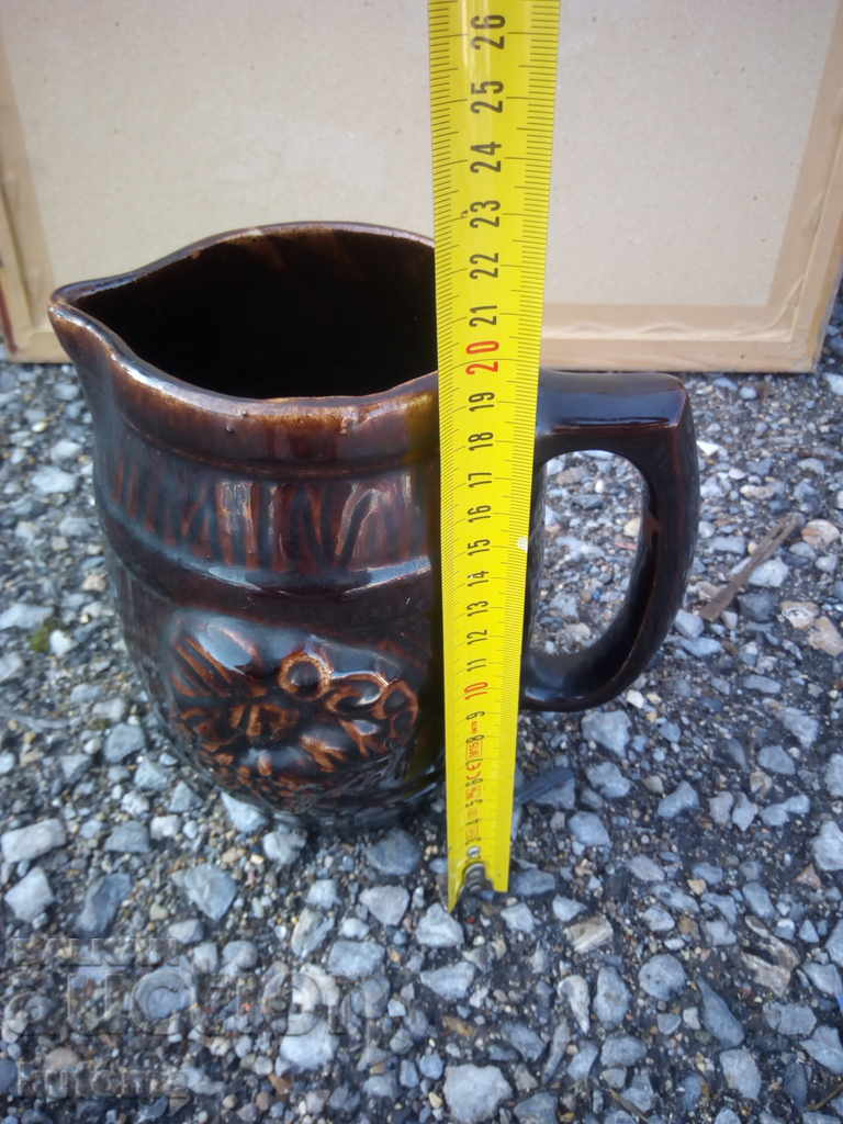 Auction An old ceramic jug Auction An old ceramic jug