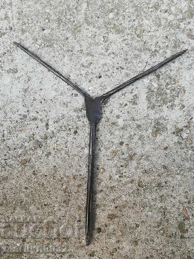 Ancient crutch, burgundy, screwdriver, wrought iron
