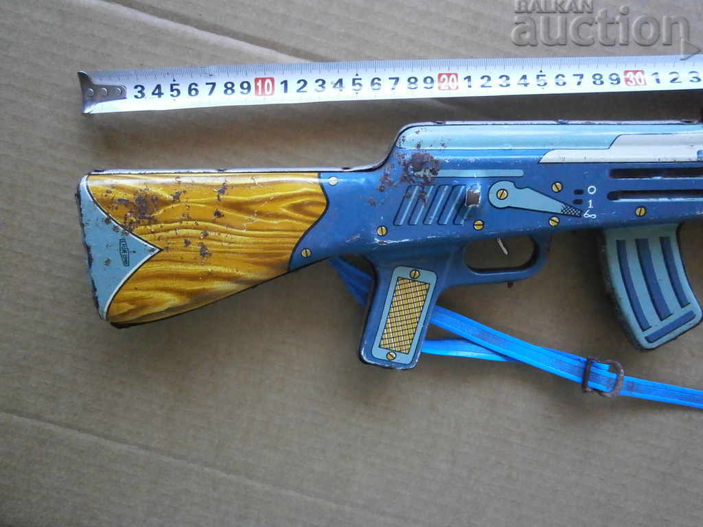Auction metal sheet toy Kalashnikov AK 47 rifle Auction metal sheet toy Kalashnikov AK 47 rifle
