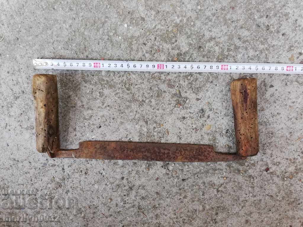 Delivery of Old rusty wrought iron tool Delivery of Old rusty wrought iron tool