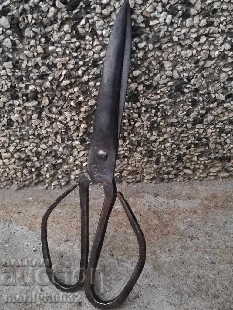 Old hand forged scissors, wrought iron