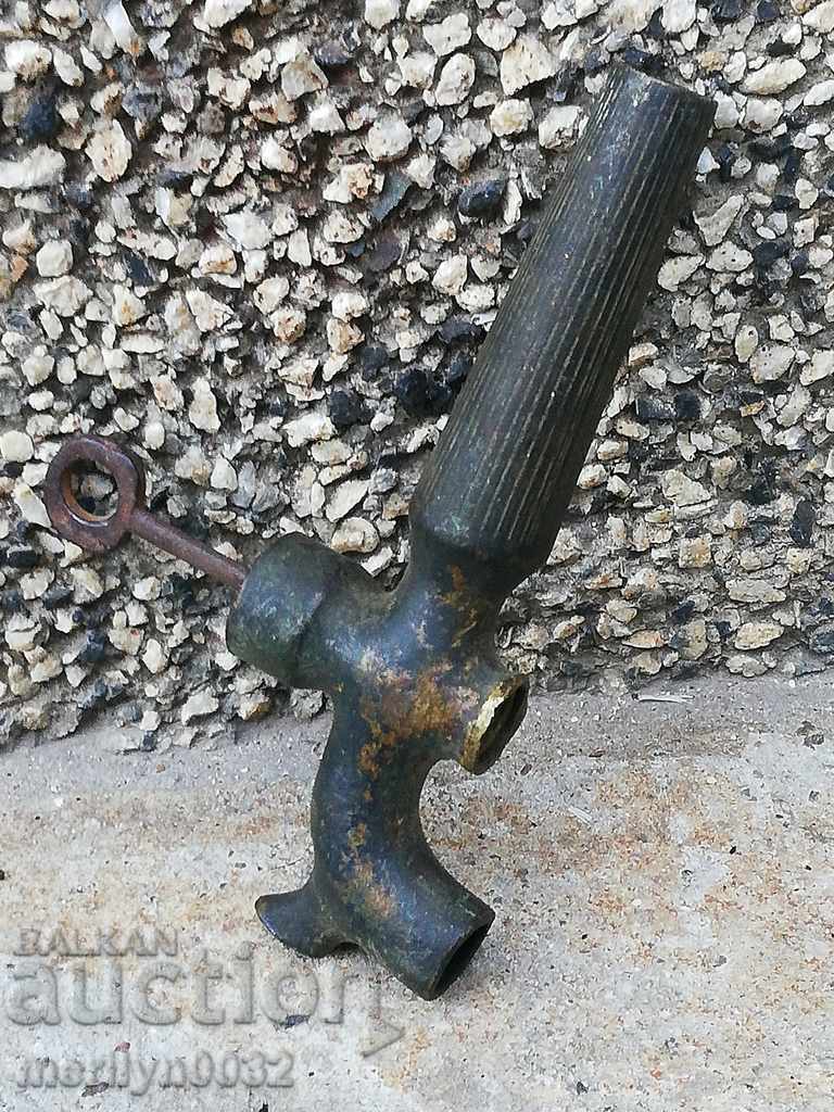 Old bronze faucet, cinnamon faucet with key