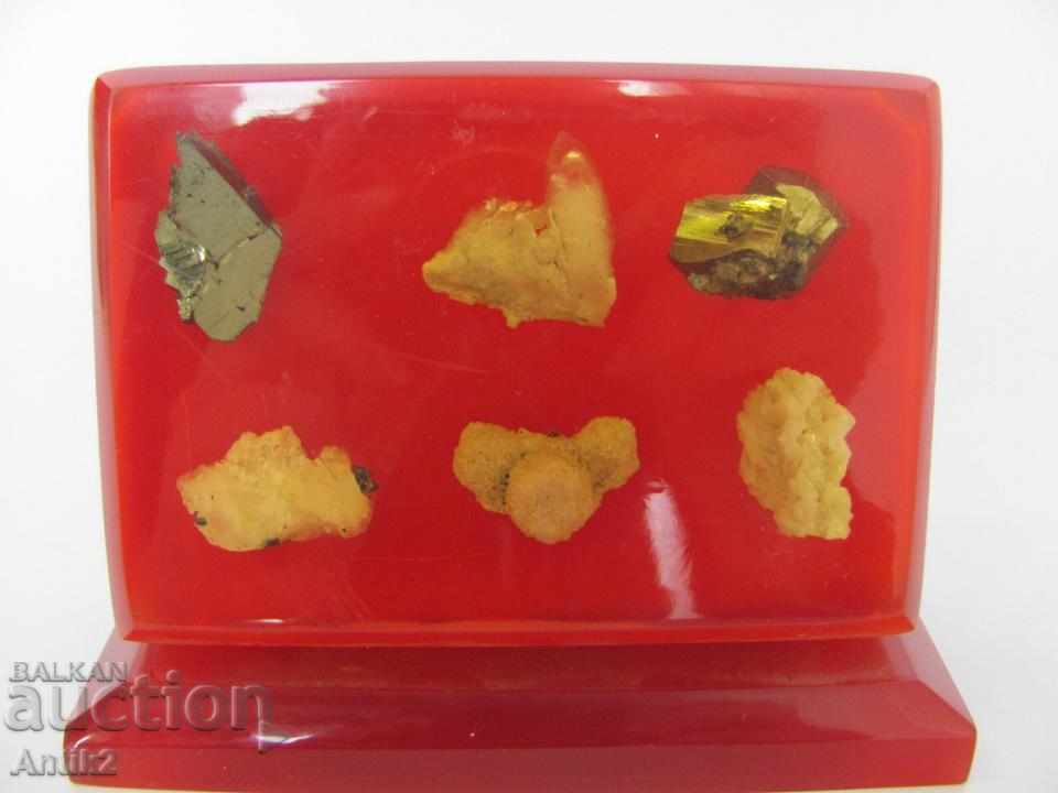 An old Plexiglas Plaque with crystals and semi-precious stones