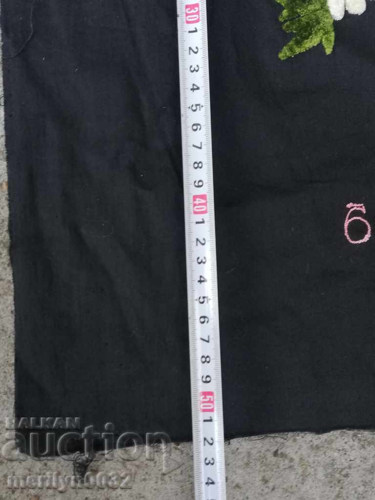 Delivery of Old embroidered patchwork sewn onto an apron pillow