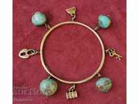 Silver Bracelet with Gilded Talismans and Turquoise