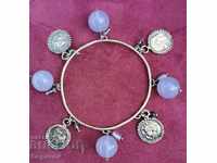 Silver Bracelet with Gilded Talismans and Amethyst