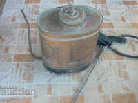 An old copper sprayer