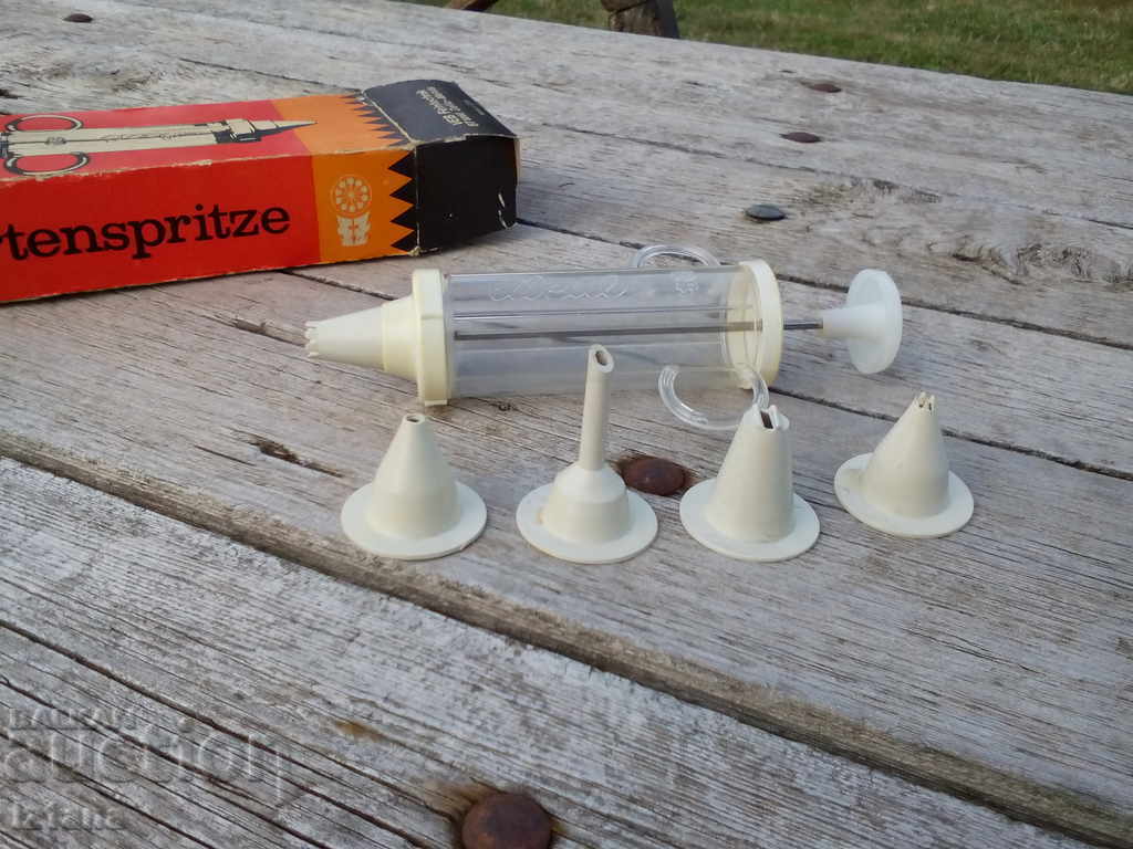 Auction An old pastry syringe Auction An old pastry syringe