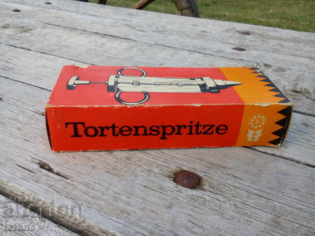 An old pastry syringe An old pastry syringe