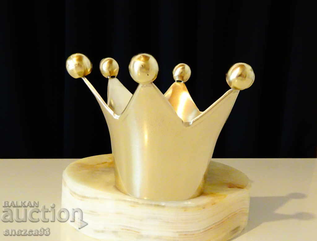 Bronze candlestick crown.