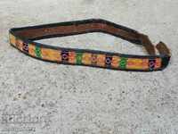 An old hand-woven leather waistband belt