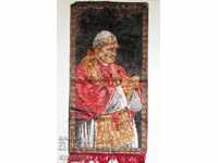 Stayer is a religious rug for a wall with the Pope