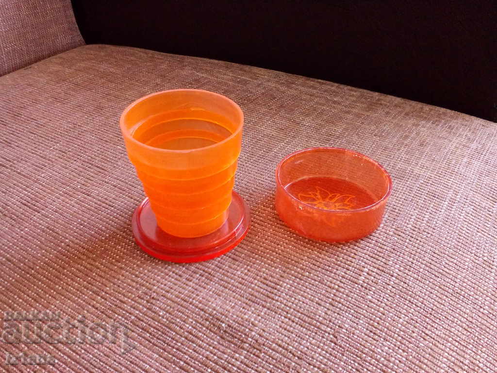 Auction  An old folding glass