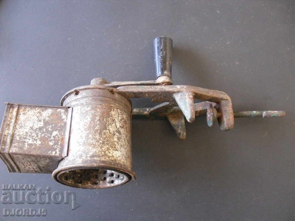 An old grinder marked with price 4.00 BGN | € 2.05
