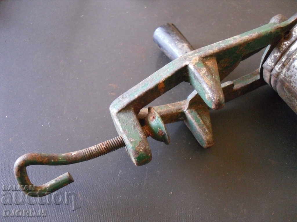 An old grinder marked - 5