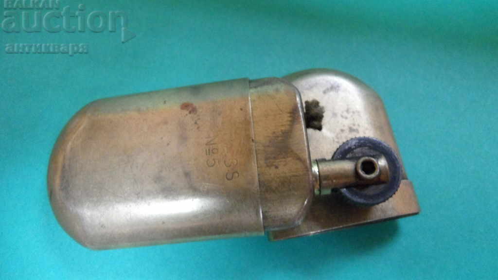 Old gasoline lighter - brass