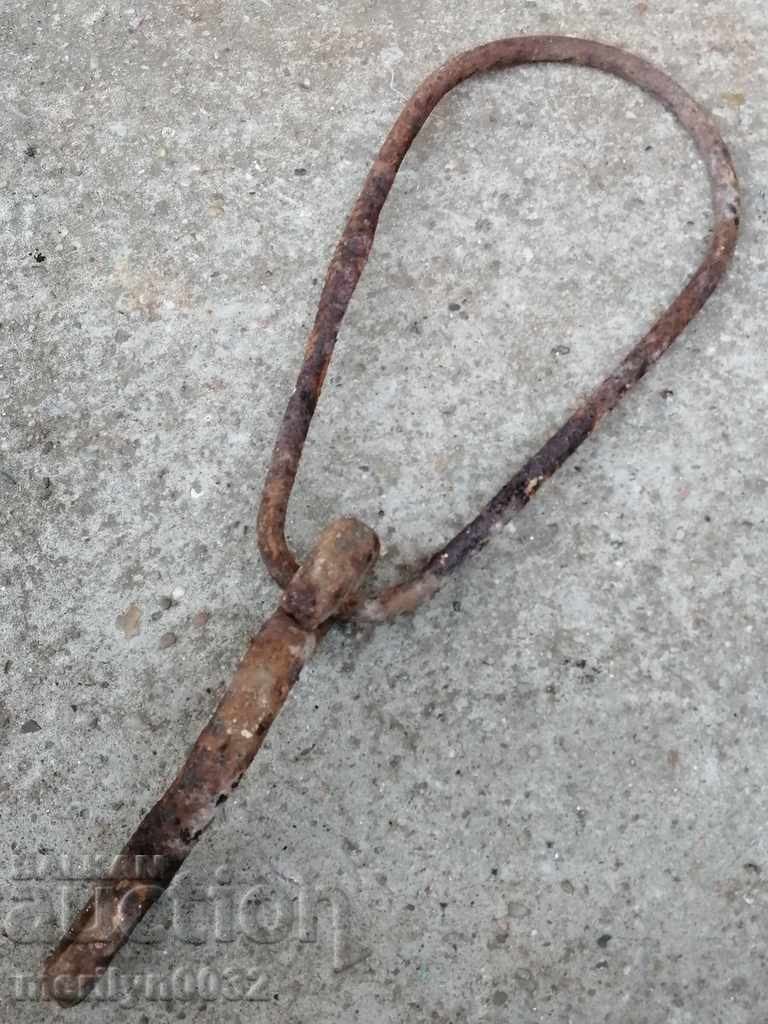 An old forged hook with a ring, a cogger, an anchor wrought iron - 5 An old forged hook with a ring, a cogger, an anchor wrought iron - 5