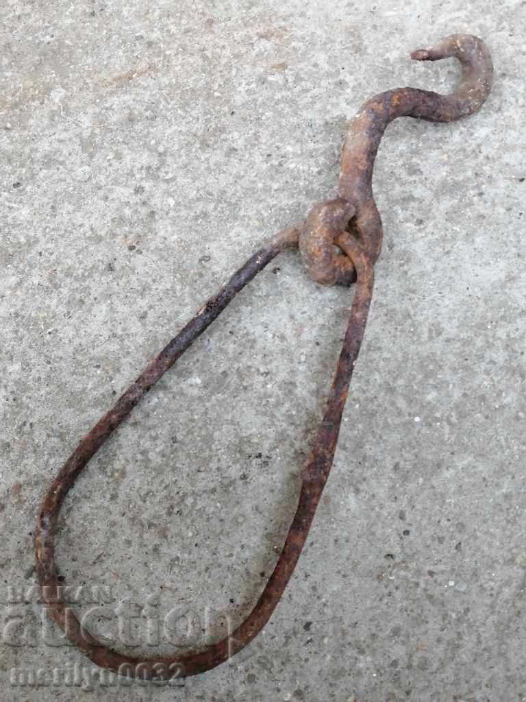 An old forged hook with a ring, a cogger, an anchor wrought iron - 6 An old forged hook with a ring, a cogger, an anchor wrought iron - 6
