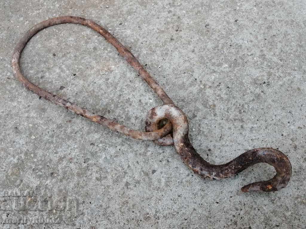 An old forged hook with a ring, a cogger, an anchor wrought iron - 7 An old forged hook with a ring, a cogger, an anchor wrought iron - 7