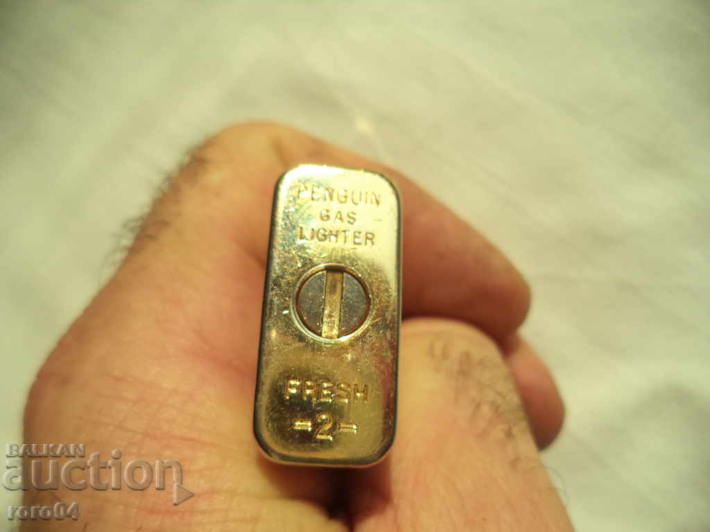 Auction  PENGUIN GAS LIGHTER