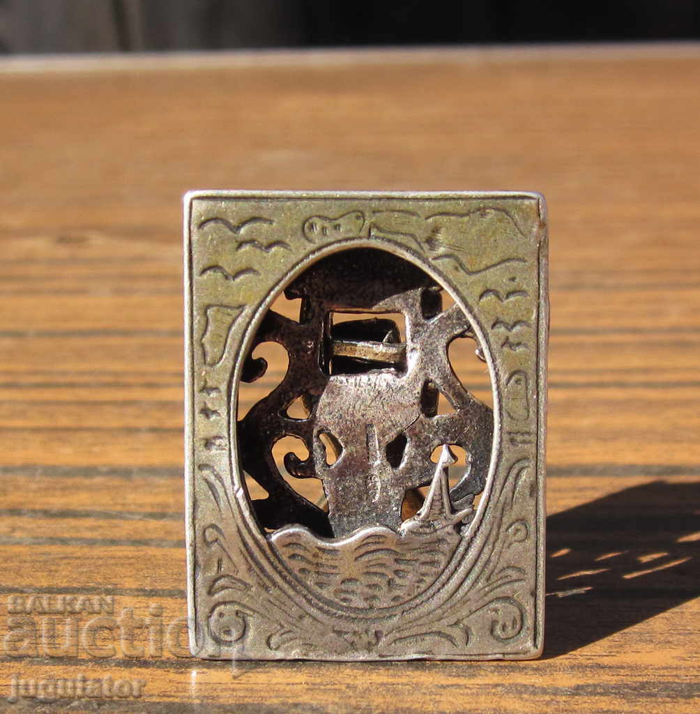 Antique silver photo frame with a nautical motif, hallmarked