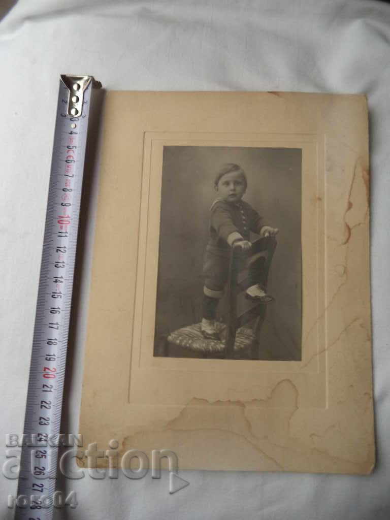 Auction  JUST BEFORE HE FALLS FROM THE CHAIR