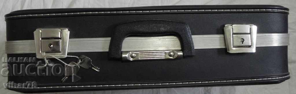 suitcase with two keys