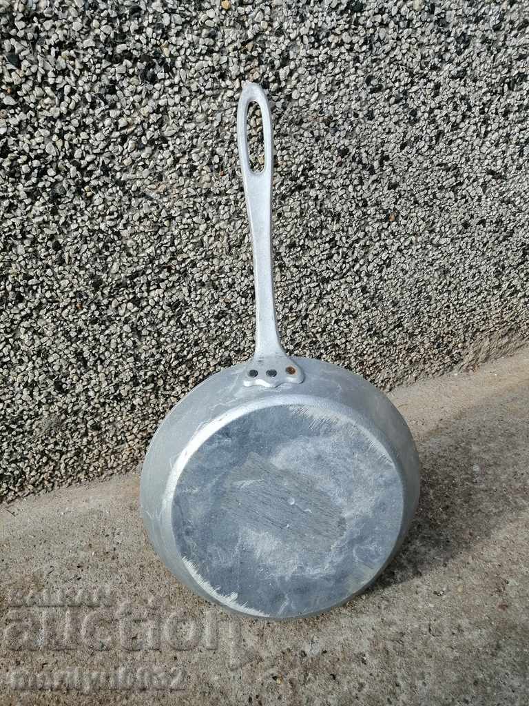 Delivery of Old 1946 aluminum pan labeled kitchenware Delivery of Old 1946 aluminum pan labeled kitchenware