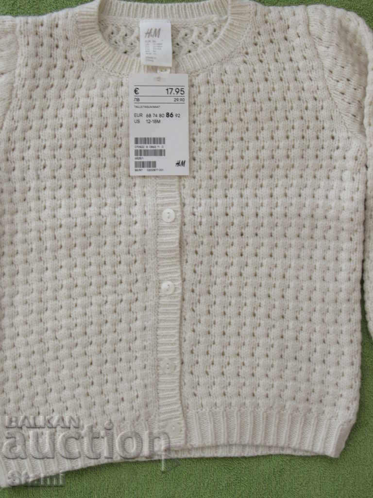 Livrarea Nou cardigan pentru copii H&M pentru o fată