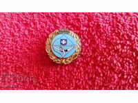 Old sports badge on a screw