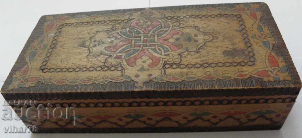 Old wooden box with a mirror