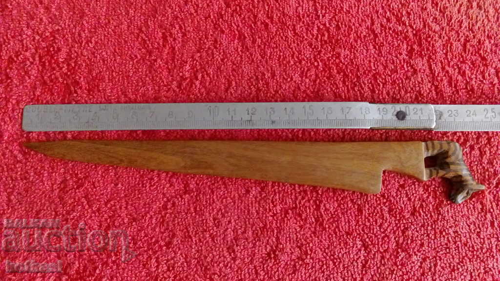 Old wooden knife for paper envelopes zebra