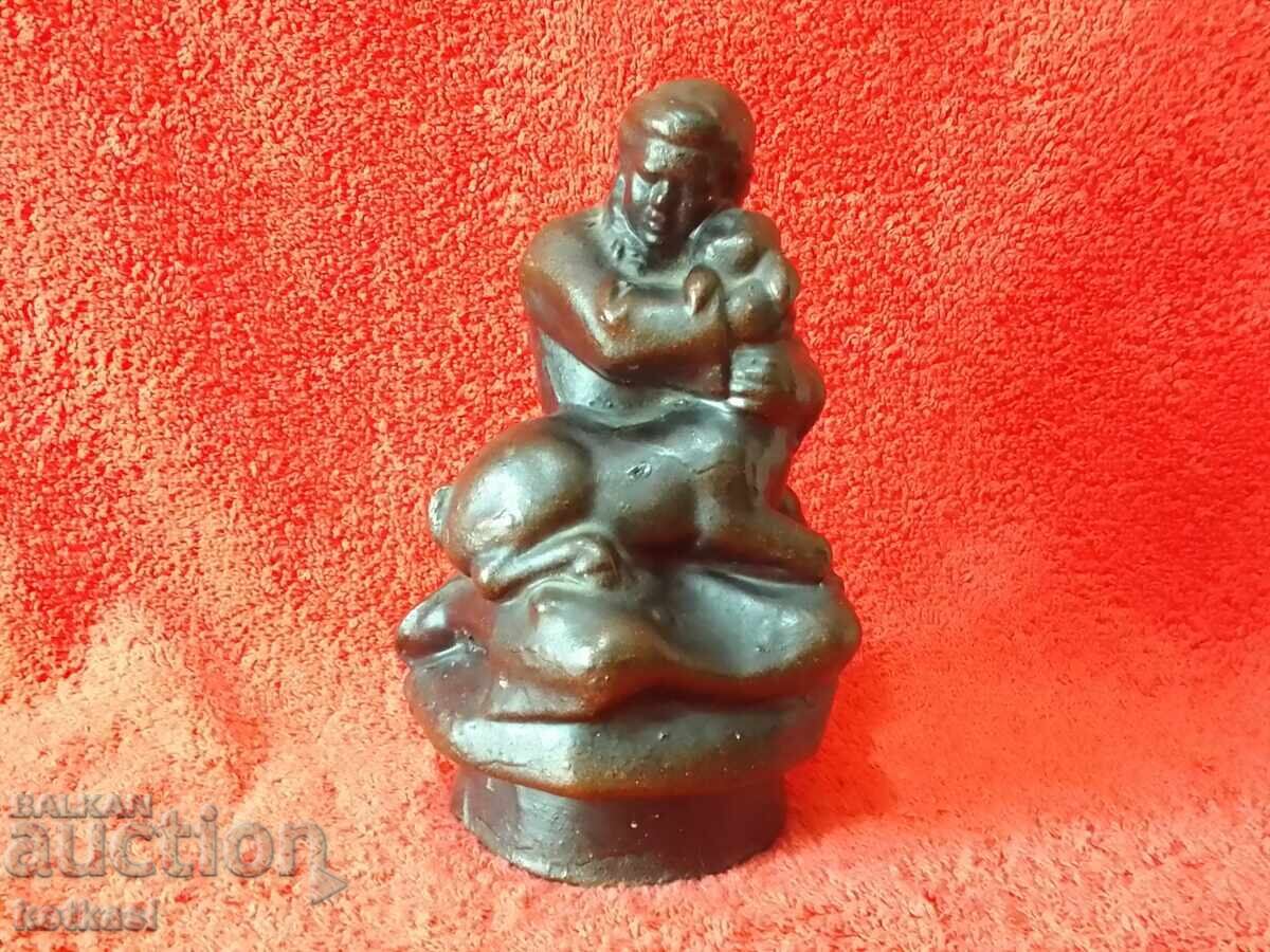 Old ceramic figure of a shepherd Indian boy lamb