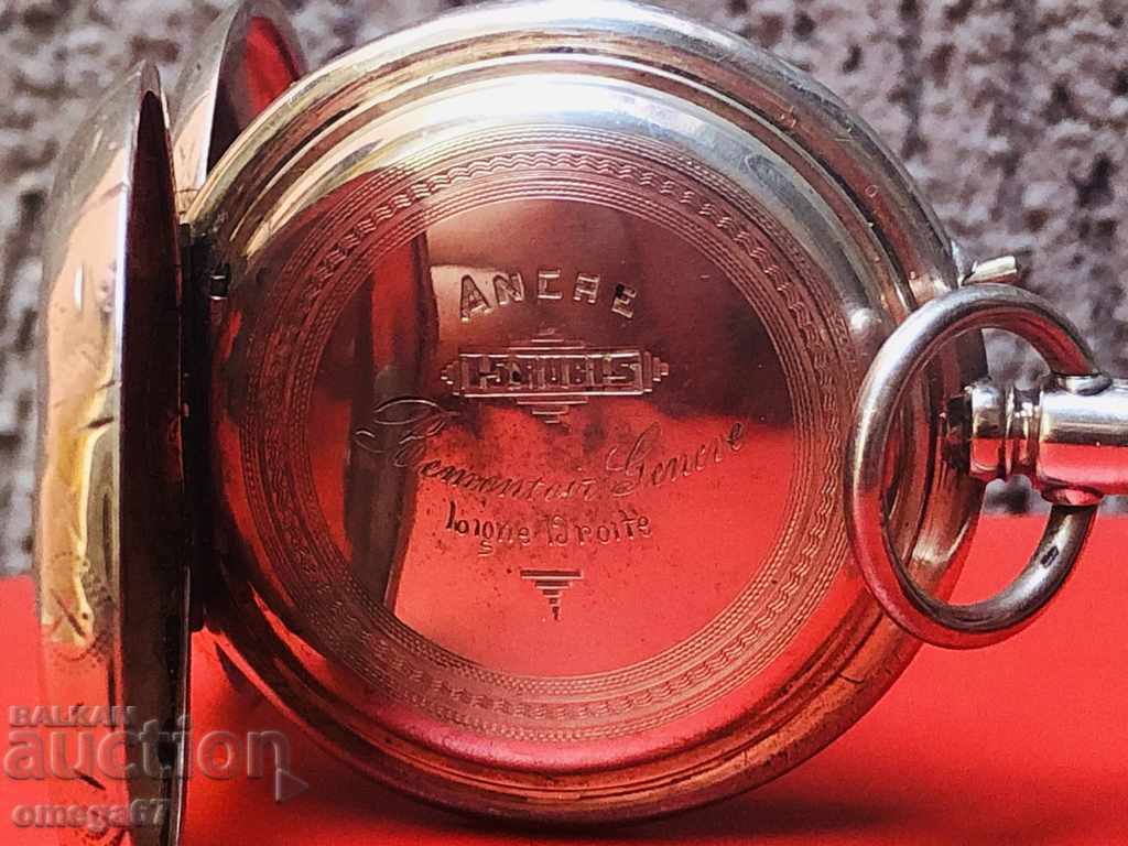 Auction  A large silver pocket watch from the late 19th century