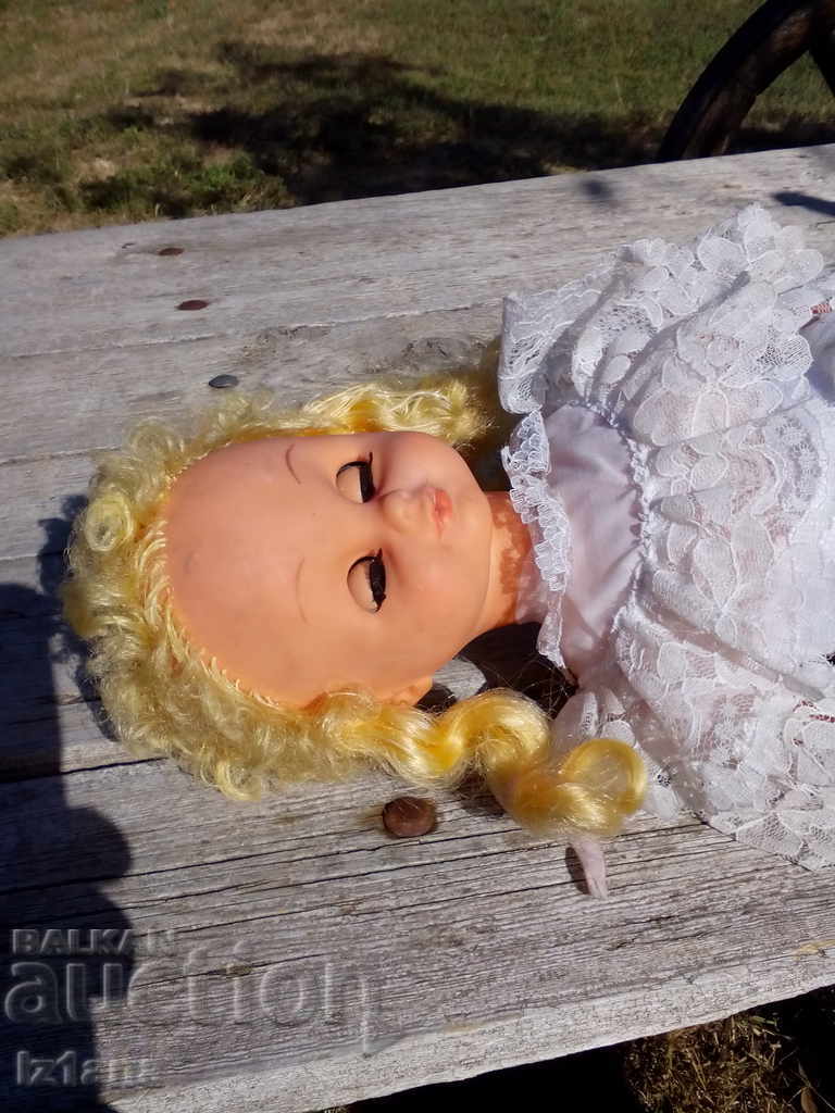 Auction An old doll Auction An old doll