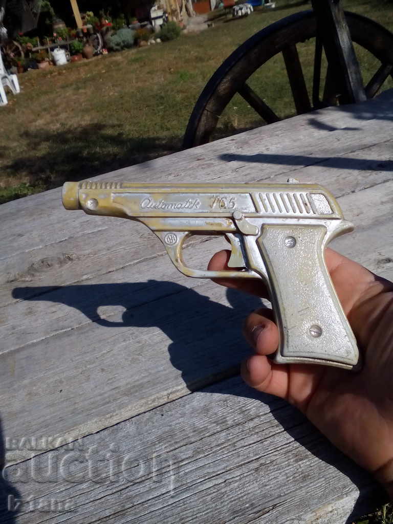 Old toy gun with price 7.00 BGN | € 3.58