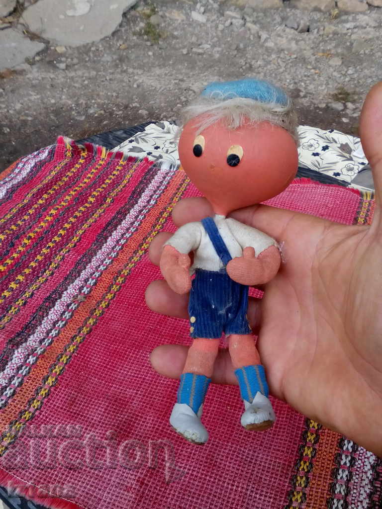 Auction  An old doll