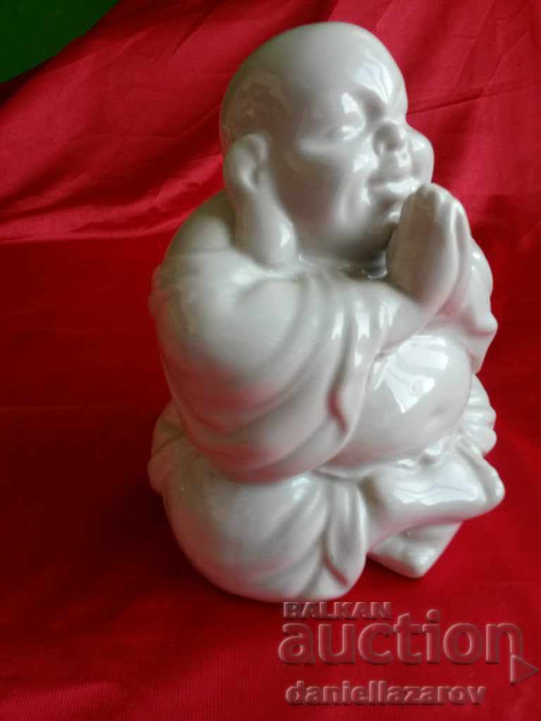 Auction  Porcelain Figurine BUDA