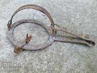 Old hand forged trap, wrought iron primitive