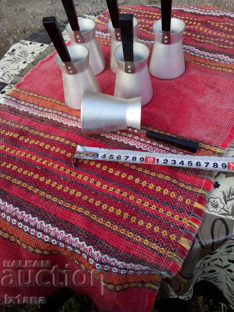 Auction Old cezve, cezve for Turkish coffee on sand Auction Old cezve, cezve for Turkish coffee on sand