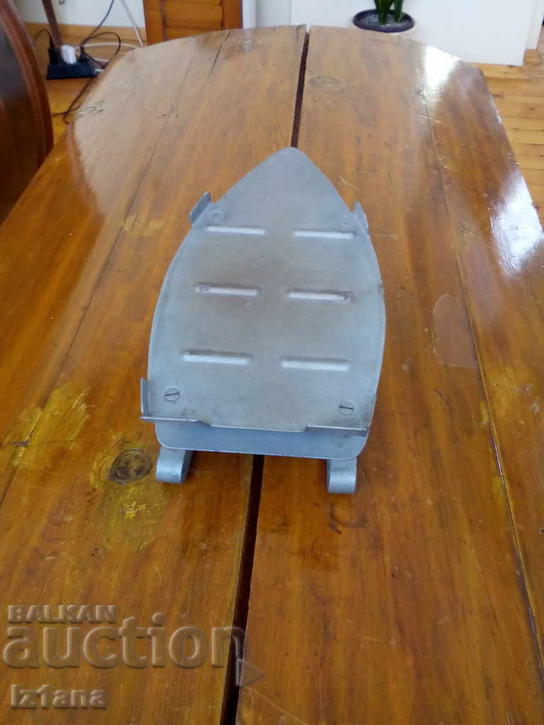 An old iron stand with price 20.00 BGN | € 10.23 An old iron stand with price 20.00 BGN | € 10.23