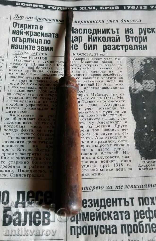 Old screwdriver with wooden handle