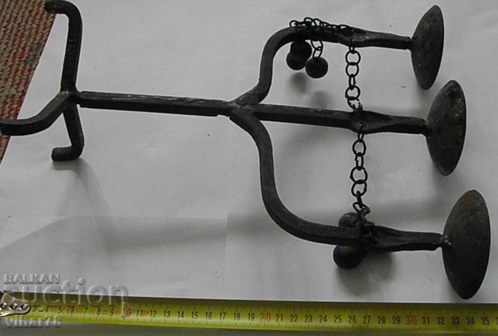 Auction WROUGHT IRON CANDLESTICK Auction WROUGHT IRON CANDLESTICK