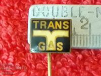 Old solid bronze pin badge marked TRANS GAS