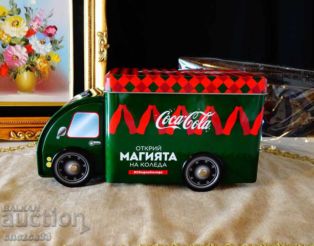 Auction  Coca-Cola truck, metal can.