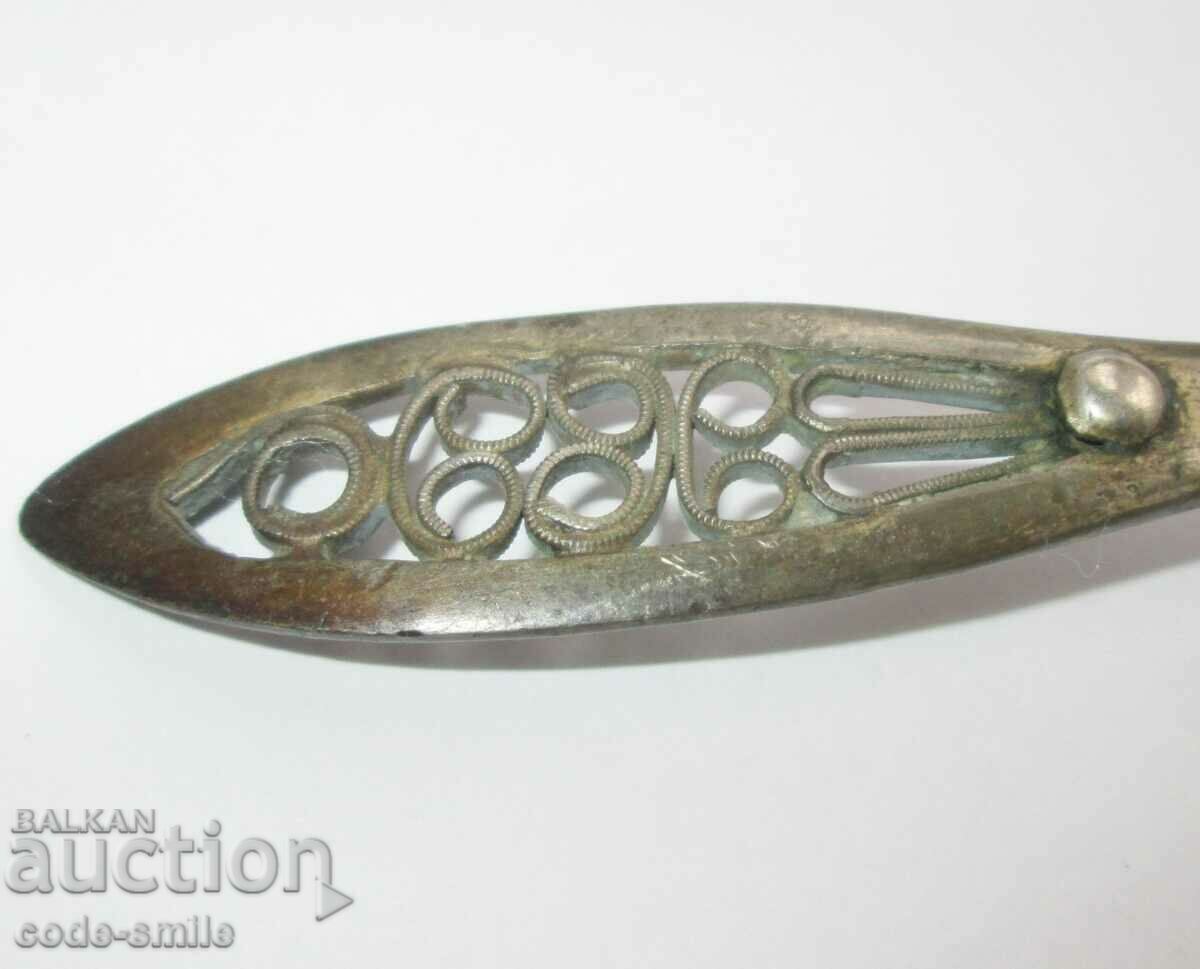 Auction  Old revival spoon chopped