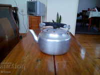 Old aluminum teapot