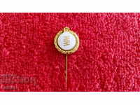 Old metal badge bronze needle enamel light bulb