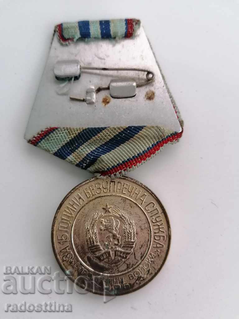 Medal For 15 years, an impeccable service to the Construction Forces with price 5.00 BGN | € 2.56 Medal For 15 years, an impeccable service to the Construction Forces with price 5.00 BGN | € 2.56